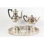 GARRARD & Co FOUR PIECE ELECTROPLATED TEA AND COFFEE SERVICE, of rounded oblong form with angular