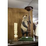 CARVED AFRICAN IVORY VASE AND A CAST IRON PANDA FIRESIDE COMPANION AND SMOKERS' COMPANION (2)