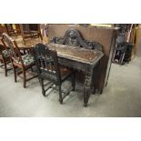 LATE VICTORIAN RENAISSANCE STYLE CARVED OAK SIDE TABLE WITH LOW RAISED BACK AND A SIMILAR SINGLE