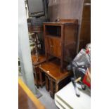 MAHOGANY OCCASIONAL TABLE WITH TWO NESTING DROP-LEAF TABLES FITTED BELOW AND A TWO DOOR BEDSIDE