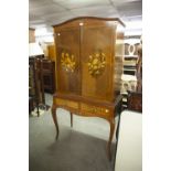 REPRODUCTION MAHOGANY AND INLAY COCKTAIL CABINET, THE SOLID DOORS ENCLOSING GLASS SHELVES, THE DOORS