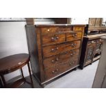 EARLY NINETEENTH CENTURY LARGE CHEST OF TWO SHORT AND THREE LONG DRAWERS ON LATER TURNED FEET, 4'