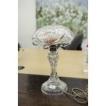 A CUT GLASS CRYSTAL TABLE LAMP, WITH MUSHROOM SHAPED SHADE ON SPREAD BASE
