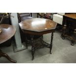 EARLY 20th CENTURY INLAID ROSEWOOD OCTAGONAL CENTRE TABLE WITH TURNED SUPPORTS AND SHAPED UNDERTIER