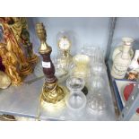 A TABLE LAMP WITH WOODEN AND BRASS STAND, AN ANNIVERSARY CLOCK WITH GLASS DOME, A GLASS BOWL AND