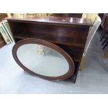 MAHOGANY THREE TIER OPEN BOOKSHELVES AND AN OVAL WALL MIRROR IN MAHOGANY FRAME (2)