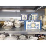 FIVE BOXED CERAMIC WEDGWOOD ITEMS, INCLUDING; TWO CLOCKS, 2 BASKETS, SALT AND PEPPER AND A