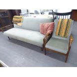 GUY ROGERS ?? TEAK FRAMED LONG SETTEE WITH PULL OUT LEVER ACTION TO CONVERT TO A BED, WITH GREEN