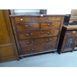 EARLY NINETEENTH CENTURY LARGE CHEST OF TWO SHORT AND THREE LONG DRAWERS ON LATER TURNED FEET, 4'