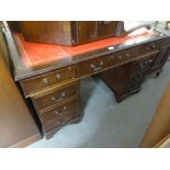 A REPRODUCTION MAHOGANY TWIN PEDESTAL DESK