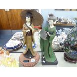 A LARGE COMPOSITION FIGURE OF A JAPANESE WOMAN HOLDING A LOOSE PARASOL, ON CIRCULAR BASE WITH