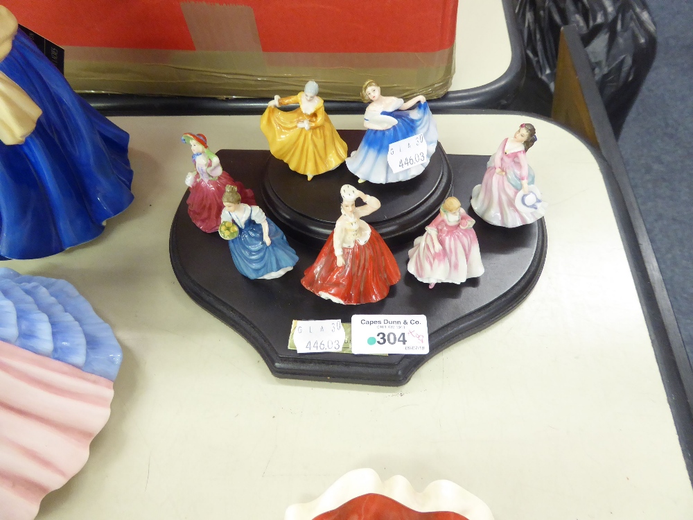 A SET OF SEVEN ROYAL DOULTON CHINA MINIATURE CRINOLINE FIGURES, 'KIRSTY' M240, ETC., MADE IN CHINA