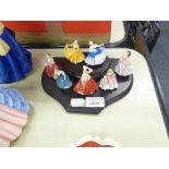 A SET OF SEVEN ROYAL DOULTON CHINA MINIATURE CRINOLINE FIGURES, 'KIRSTY' M240, ETC., MADE IN CHINA