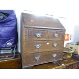 EARLY/MID 20th CENTURY OAK BUREAU, THE FALL-FRONT ENCLOSING FITTED COMPARTMENTS, OVER TWO SHORT