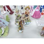 A PAIR OF CAPO DI MONTE CHINA FIGURES BOY AND GIRL EACH STANDING ON ONE LEG, 7 ½" HIGH AND ANOTHER