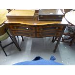 EDWARDIAN MAHOGANY SERPENTINE SIDE CABINET OF FOUR SHORT DRAWERS, ON SQUARE FLUTED SUPPORTS