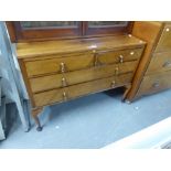 EDWARDIAN FLAME MAHOGANY DRESSING TABLE BASE OF TWO SHORT OVER TWO LONG DRAWERS, ALL RAISED ON