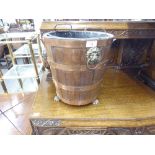 AN OAK CIRCULAR COAL BUCKET WITH REMOVABLE LINER