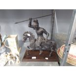 A CAST IRON STATUE OF A KNIGHT, ON STEED HOLDING A SPEAR ALOFT AND A SWORD ON WOODEN PLINTH BASE