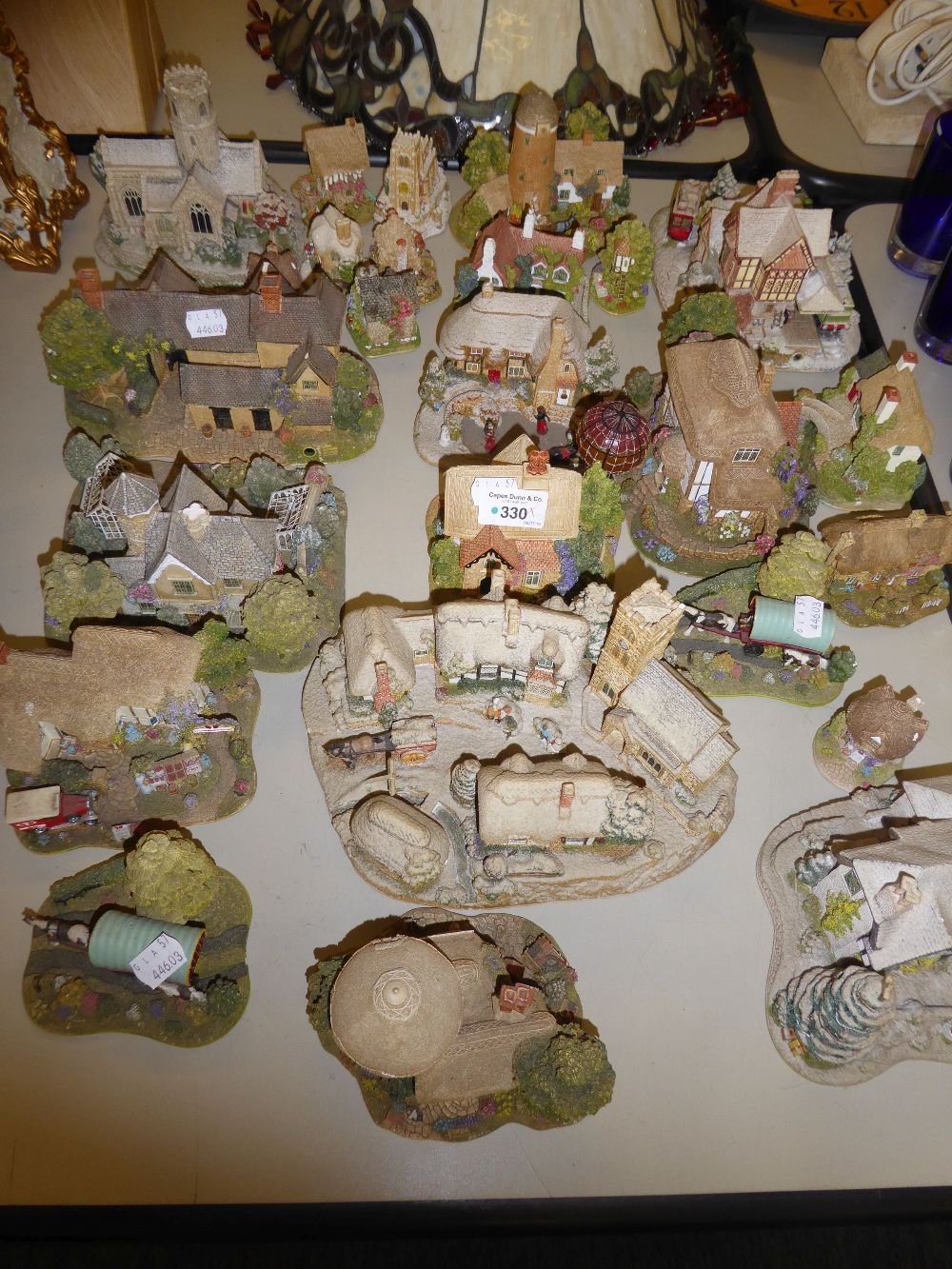 A COLLECTION OF APPROX 22 MAINLY 'LILIPUT LANE' RESIN MODELS OF COTTAGES ETC…..