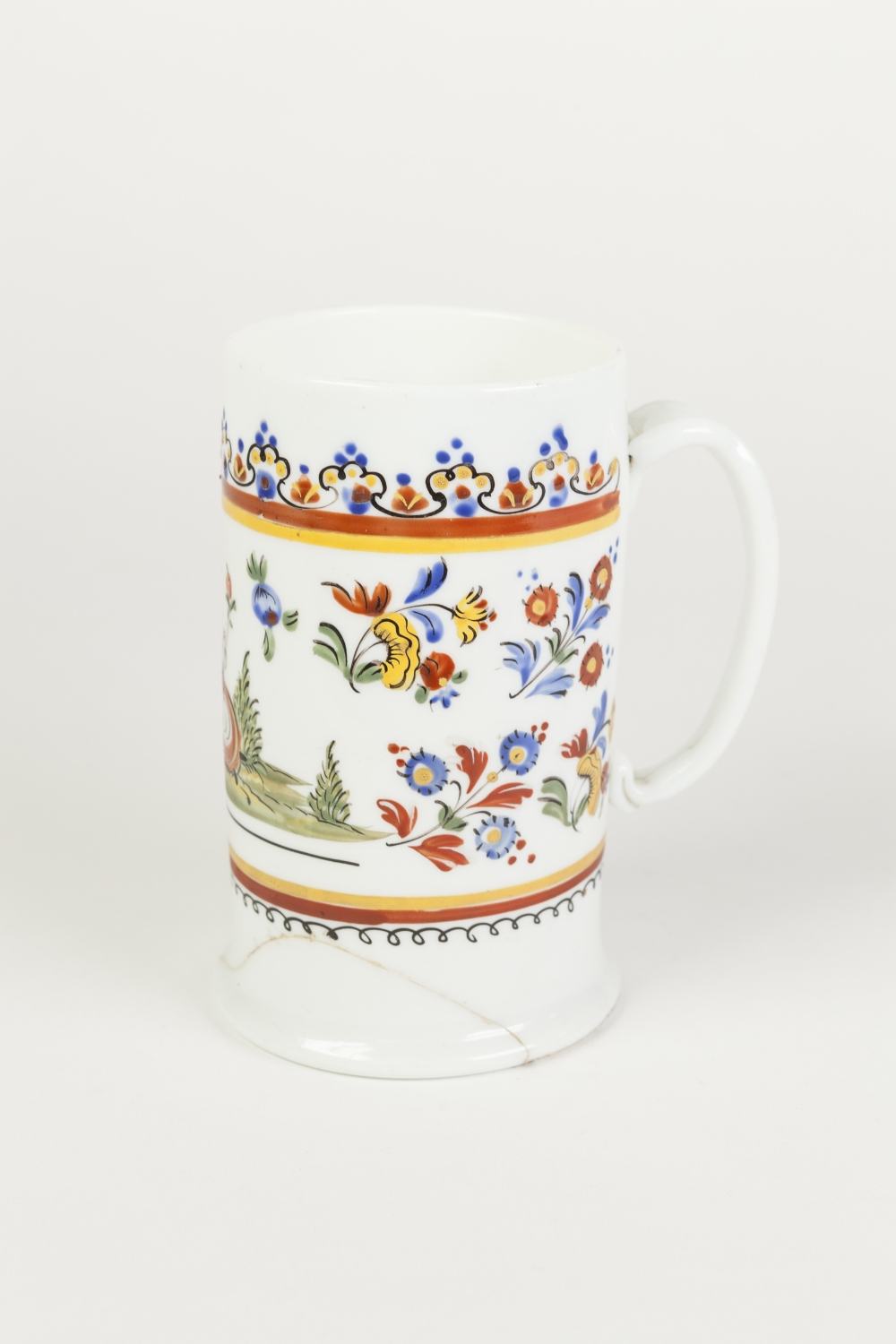 A LATE EIGHTEENTH CENTURY GERMAN MILCHGLAS BEER MUG, colourfully enamelled with a vignette of a lady