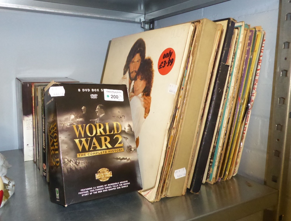 A QUANTITY OF DVD's AND VINYL LP RECORDS