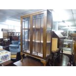 EARLY 20th CENTURY PETITE OAK DISPLAY CABINET, glazed doors and sides enclosing two shelves