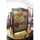 A MAHOGANY EDWARDIAN SERPENTINE TOP SIDE TABLE, ON CABRIOLE SUPPORTS AND AN OAK FRAMED FIRE-SCREEN