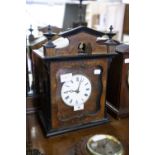 A NINETEENTH CENTURY BLACK FOREST CUCKOO CLOCK, WITH HAND PAINTED DECORATIONS ON DOOR AND CASE