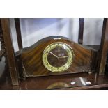 CIRCA 1920's LARGE OAK CASED MANTEL CLOCK AND AN ARTS AND CRAFTS DESIGN PIANO STOOL (IN NEED OF