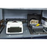 AN OLYMPIA TYPEWRITER AND ANOTHER IN CASE (2)