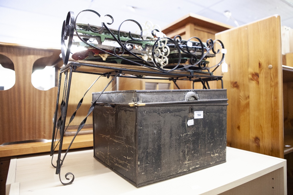 EIGHTEEN CAST IRON PLANT POT STANDS, A METAL PLANT TROUGH AND A JAPANNED METAL DEED BOX