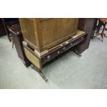A MAHOGANY REGENCY STYLE SOFA STYLE LOW OCCASIONAL TABLE, WITH INLET LEATHER TOP, FALL ENDS WITH TWO