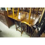 AN ELM AND OAK OBLONG GATE LEG DINING TABLE, ON BALUSTER SUPPORTS