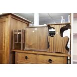 A TEAK STOOL OR COFFEE TABLE AND TWO PERIODICAL RACKS