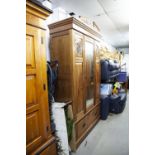 A VICTORIAN WALNUT MIRROR DOOR WARDROBE WITH DRAWER BELOW