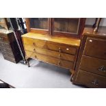 EDWARDIAN FLAME MAHOGANY DRESSING TABLE BASE OF TWO SHORT OVER TWO LONG DRAWERS, ALL RAISED ON