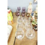 A SET OF SIX ITALIAN LILAC TULIP SHAPE GOBLETS AND SIX CUT GLASS BRANDY BALLOONS (12)