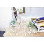 A QUANTITY OF CUT AND MOULDED STEM WINE GLASSES TO INCLUDE; CHAMPAGNE, SHERRY AND COLOURED TALL