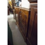 A LARGE CIRCA 1930's BURR WALNUTWOOD TWO DOOR SIDE CABINET OR DRINKS CABINET, ENCLOSING A CERAMIC