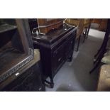 GILBERT, CIRCA 1920's SPRING DRIVEN GRAMOPHONE WITH SPEAKER AND RECORD STORAGE BEHIND PANEL DOORS