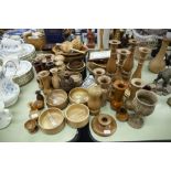 A PAIR OF CARVED OAK CANDLESTICKS AND A QUANTITY OF WOODEN OBJECTS; BOWLS, CANDLESTICKS, CONDIMENT