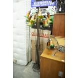 A MODERN STYLISH STANDARD LAMP HAVING 12 FLORAL GLASS LAMPS ON SPREAD LEAF BASE AND A MATCHING TABLE