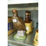 A BESWICK MATTHEW GLOAG 'THE FAMOUS GROUSE' LIQUOR' BOTTLE AND TWO WADE BELLS OLD SCOTCH WHISKEY