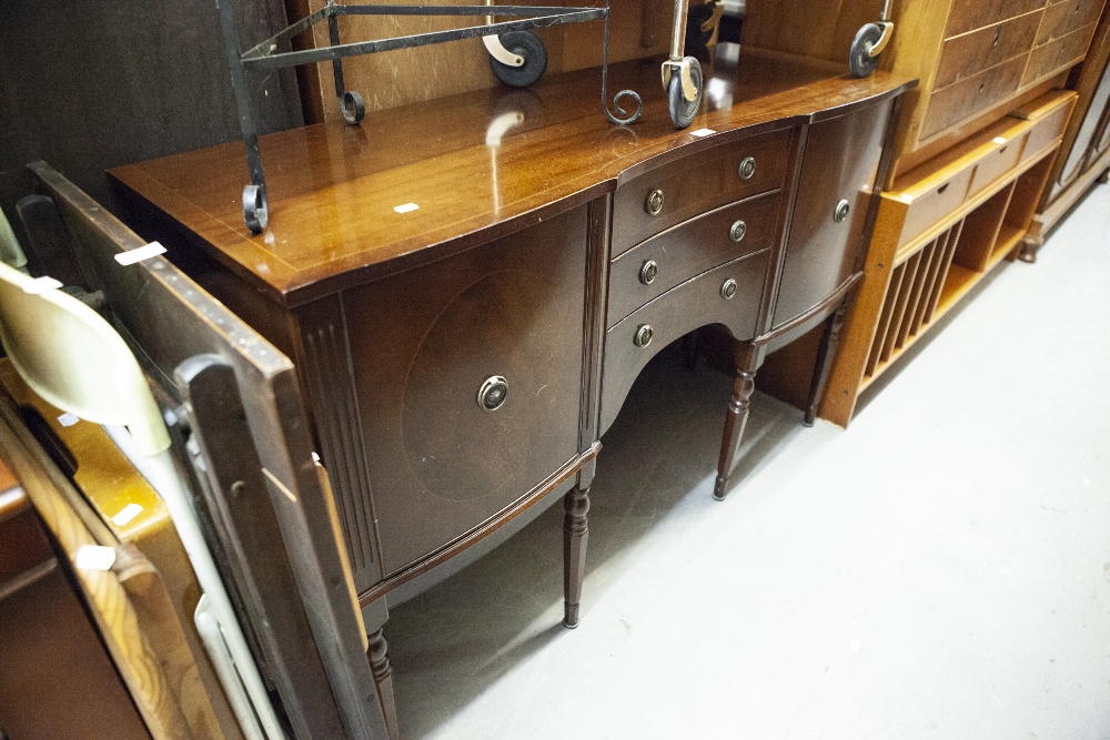 A REPRODUCTION MAHOGANY SIDEBOARD, THREE CENTRAL DRAWERS AND CUPBOARD TO EITHER SIDE