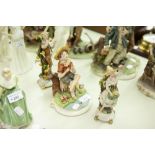 A PAIR OF CAPO DI MONTE CHINA FIGURES BOY AND GIRL EACH STANDING ON ONE LEG, 7 ½" HIGH AND ANOTHER