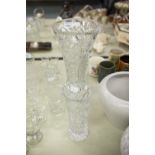 A CRYSTAL CUT GLASS VASE AND A SMALLER EXAMPLE (2)