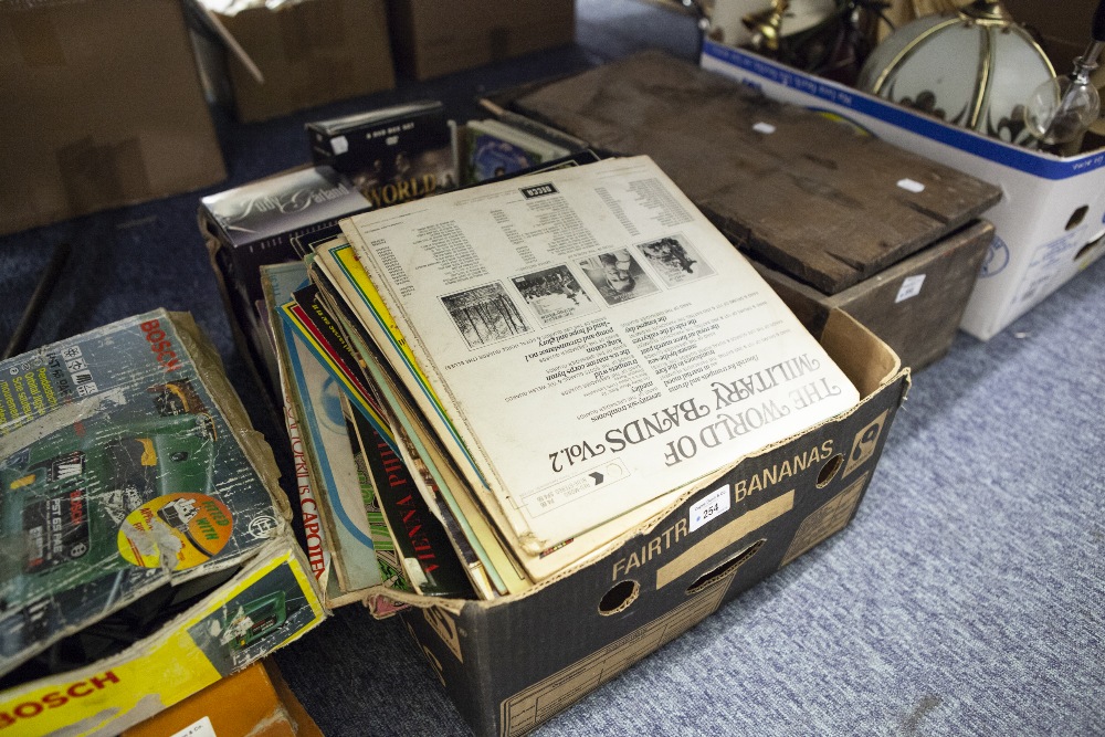 A QUANTITY OF DVD's AND VINYL LP RECORDS