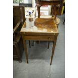 AN EDWARDIAN INLAID MAHOGANY ENVELOPE FOLDING CARD TABLE WITH DRAWER, ON TAPERING LEGS