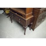 CIRCA 1920's CARVED MAHOGANY LOW CHEST OF FOUR DRAWERS, RAISED ON TALL CABRIOLE LEGS